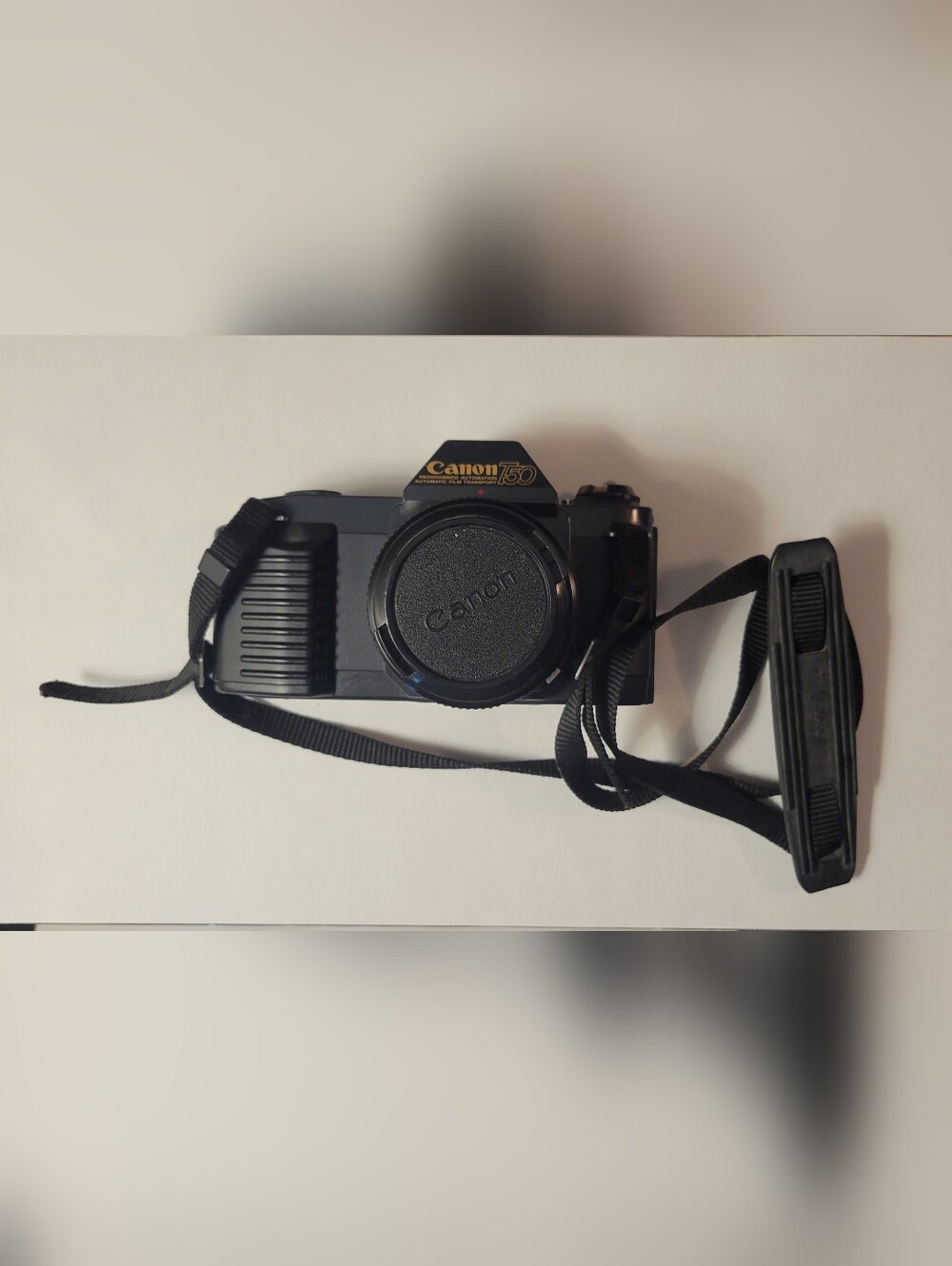Canon black film camera with 50mm FD f/1.8 lens and neck strap - Picture 6 of 6